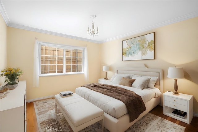 3319 Sparr Blvd, Glendale, CA 91208 - bedroom featuring ornamental molding, a chandelier, wood finished floors, and baseboards