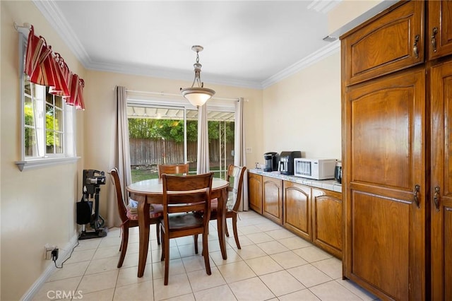 3319 Sparr Blvd, Glendale, CA 91208 - dining area featuring healthy amount of natural light, crown molding, light tile patterned floors, and baseboards