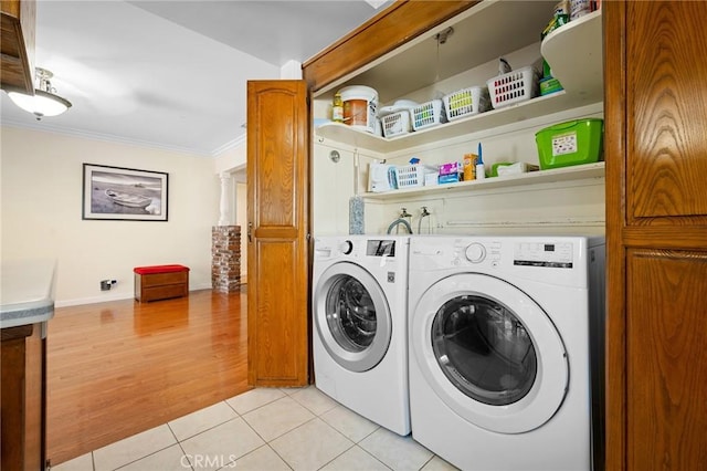 3319 Sparr Blvd, Glendale, CA 91208 - laundry area with ornamental molding, separate washer and dryer, and light tile patterned floors