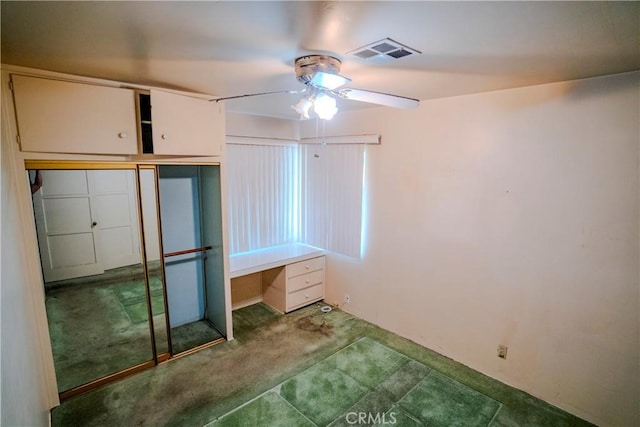 317 N 19th St, Montebello, CA 90640 - unfurnished bedroom featuring carpet, a closet, and a ceiling fan