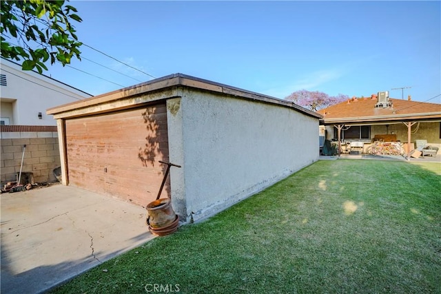 317 N 19th St, Montebello, CA 90640 - view of property exterior featuring a garage, stucco siding, and a patio