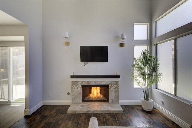 13365 Cloudburst Dr, Corona, CA 92883 - unfurnished living room featuring wood finished floors and a tile fireplace