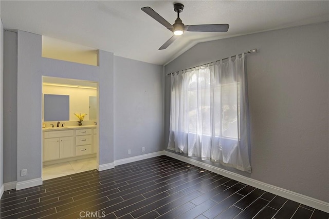 13365 Cloudburst Dr, Corona, CA 92883 - unfurnished bedroom featuring wood finish floors, lofted ceiling, ensuite bath, and ceiling fan