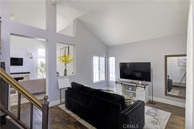 13365 Cloudburst Dr, Corona, CA 92883 - living room with a fireplace, high vaulted ceiling, and wood finished floors