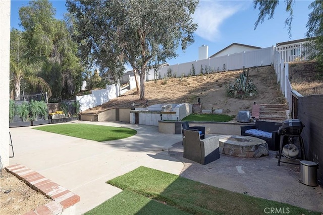 13365 Cloudburst Dr, Corona, CA 92883 - view of yard with a patio and a fire pit
