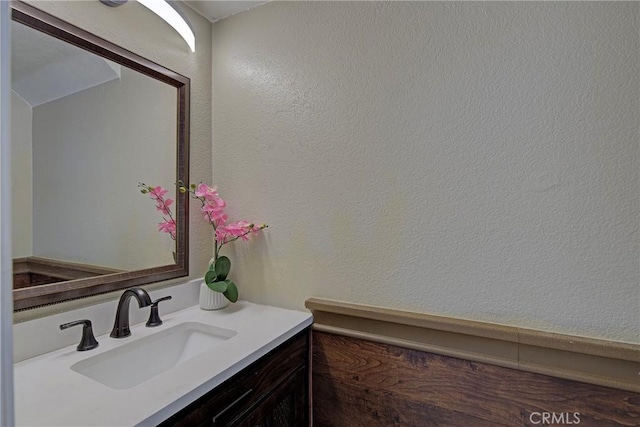 13365 Cloudburst Dr, Corona, CA 92883 - bathroom featuring vanity and a textured wall