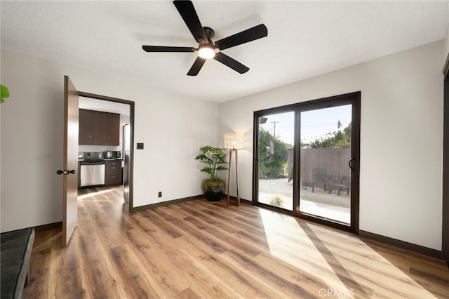 1409 N Midsite Ave, Covina, CA 91722 - unfurnished room featuring wood finished floors, ceiling fan, and baseboards