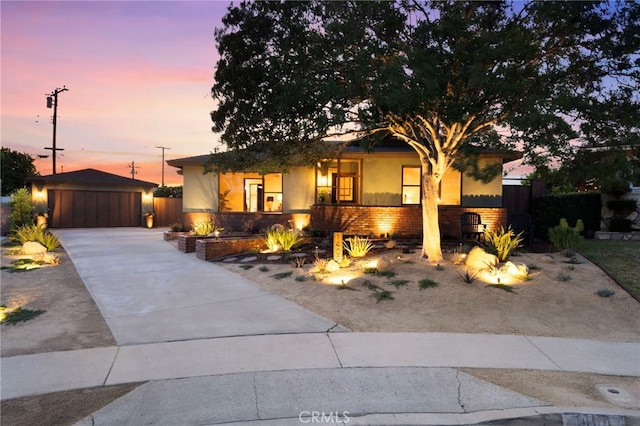 1409 N Midsite Ave, Covina, CA 91722 - ranch-style home featuring an outdoor structure, a porch, stucco siding, and a garage