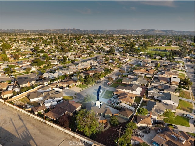 1409 N Midsite Ave, Covina, CA 91722 - aerial overview of property's location with nearby suburban area and a mountain backdrop