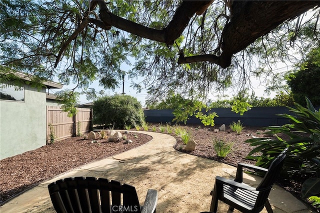 1409 N Midsite Ave, Covina, CA 91722 - fenced backyard featuring a patio
