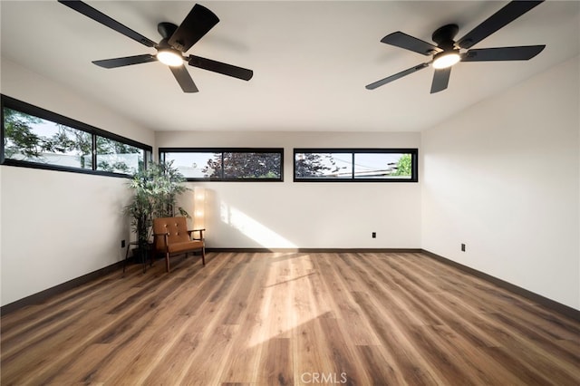 1409 N Midsite Ave, Covina, CA 91722 - unfurnished room with ceiling fan, wood finished floors, and baseboards
