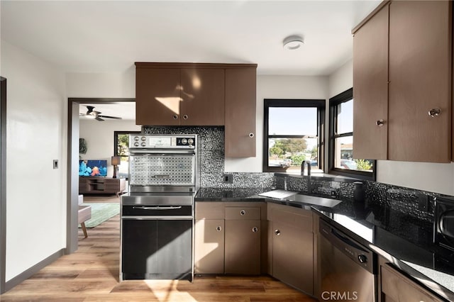 1409 N Midsite Ave, Covina, CA 91722 - kitchen featuring a sink, dishwasher, range, and healthy amount of natural light