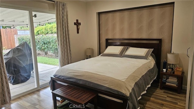 10407 Danube Ave, Granada Hills, CA 91344 - bedroom featuring wood finished floors and access to outside
