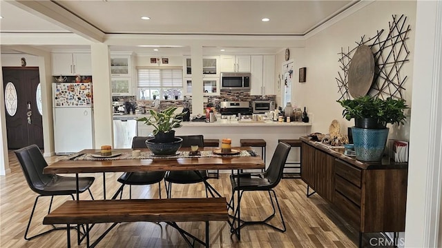 10407 Danube Ave, Granada Hills, CA 91344 - dining space with light wood-type flooring and recessed lighting