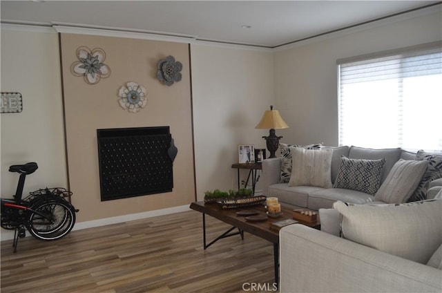 10407 Danube Ave, Granada Hills, CA 91344 - living area with crown molding, wood finished floors, and baseboards
