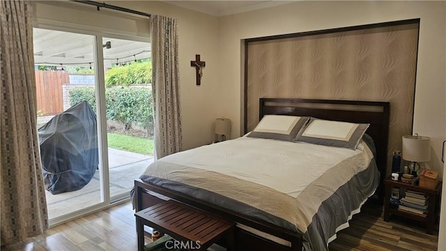 10407 Danube Ave, Granada Hills, CA 91344 - bedroom with wood finished floors and access to exterior