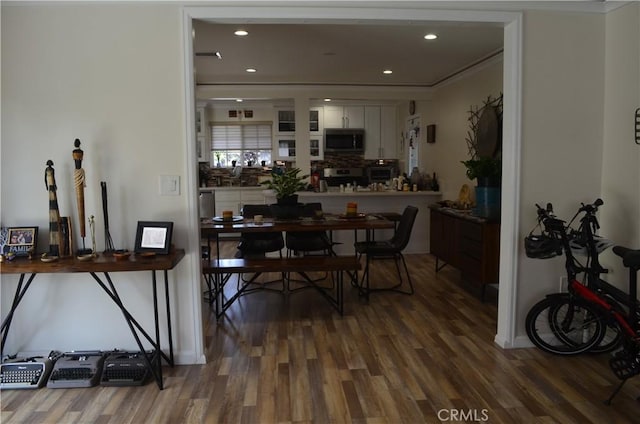 10407 Danube Ave, Granada Hills, CA 91344 - dining area featuring wood finished floors, ornamental molding, and recessed lighting