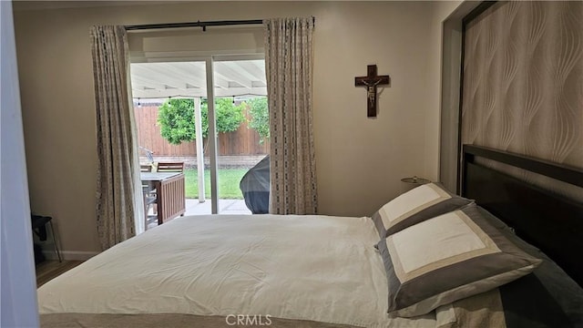 10407 Danube Ave, Granada Hills, CA 91344 - bedroom featuring access to outside and baseboards
