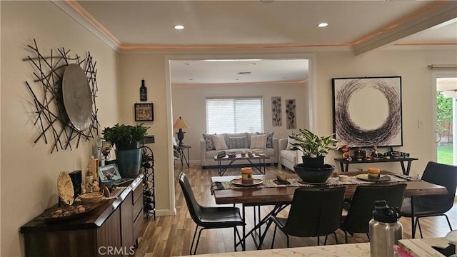 10407 Danube Ave, Granada Hills, CA 91344 - dining area featuring light wood-style floors, ornamental molding, recessed lighting, and baseboards