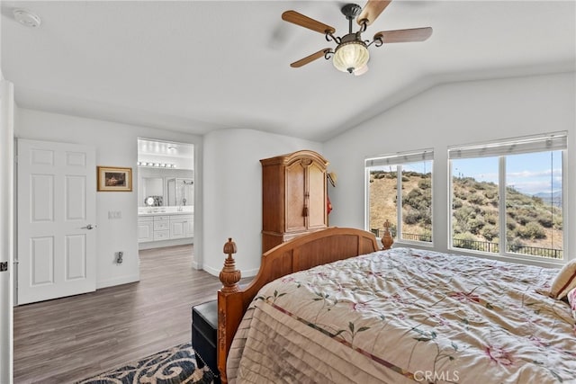 28809 Garnet Canyon Dr, Saugus, CA 91390 - bedroom featuring lofted ceiling, wood finished floors, baseboards, ensuite bath, and a ceiling fan