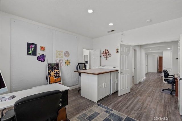 28809 Garnet Canyon Dr, Saugus, CA 91390 - home office featuring dark wood finished floors and recessed lighting