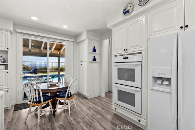 28809 Garnet Canyon Dr, Saugus, CA 91390 - kitchen featuring white appliances, white cabinetry, light wood finished floors, and recessed lighting