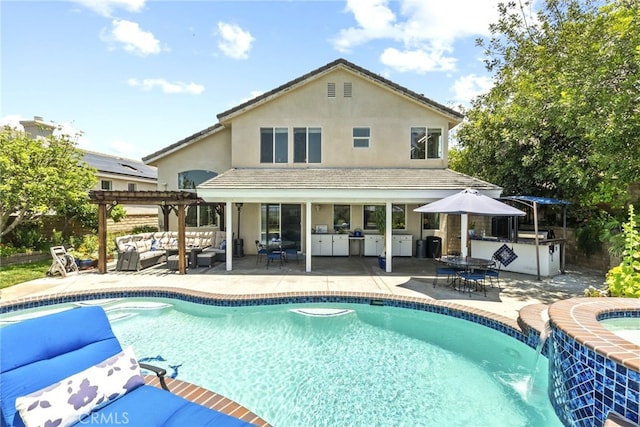 28809 Garnet Canyon Dr, Saugus, CA 91390 - rear view of property with an outdoor living space, a pergola, a patio, and stucco siding