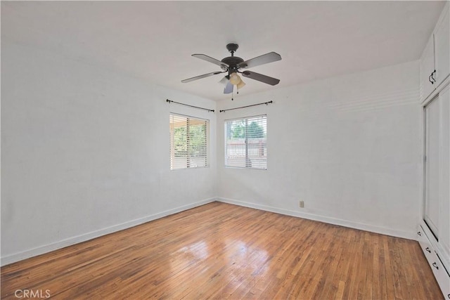 14127 Daubert St, San Fernando, CA 91340 - empty room featuring light wood-style floors, a ceiling fan, and baseboards