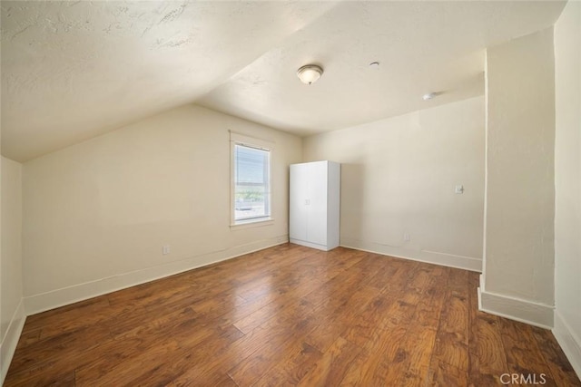8740 El Camino Real Unit A, Atascadero, CA 93422 - bonus room featuring wood finished floors, lofted ceiling, and baseboards