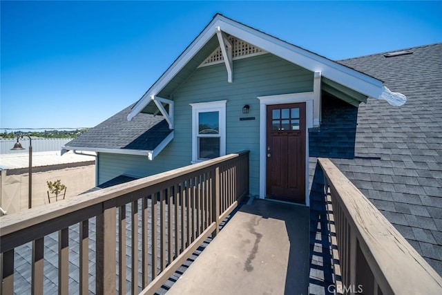 8740 El Camino Real Unit A, Atascadero, CA 93422 - view of exterior entry with a shingled roof and a water view