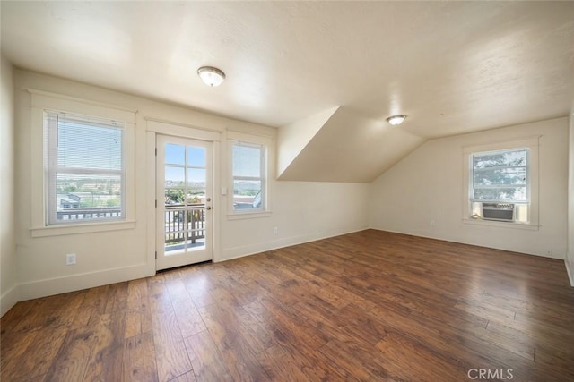 8740 El Camino Real Unit A, Atascadero, CA 93422 - bonus room with hardwood / wood-style flooring, cooling unit, vaulted ceiling, and baseboards