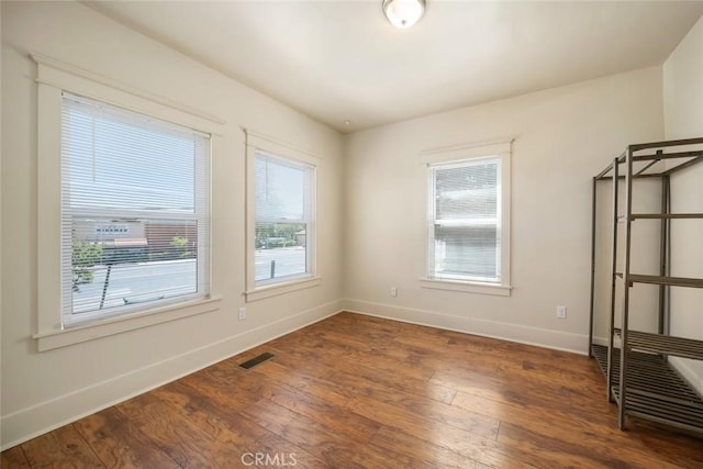 8740 El Camino Real Unit A, Atascadero, CA 93422 - empty room with baseboards and wood finished floors