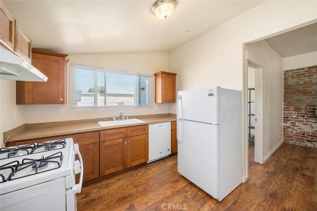 8740 El Camino Real Unit A, Atascadero, CA 93422 - kitchen featuring white appliances, a sink, vaulted ceiling, wood finished floors, and brown cabinets
