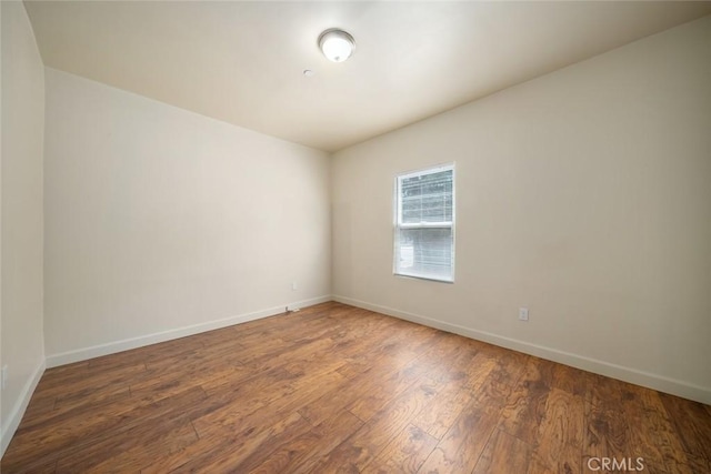 8740 El Camino Real Unit A, Atascadero, CA 93422 - spare room featuring baseboards and wood finished floors