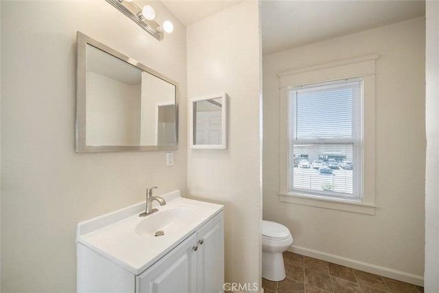 8740 El Camino Real Unit A, Atascadero, CA 93422 - bathroom with vanity, baseboards, and toilet