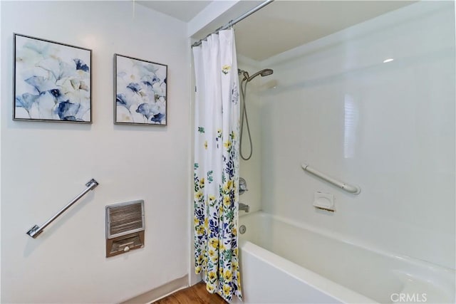 382 Avenida Castilla Unit B, Laguna Woods, CA 92637 - full bathroom featuring heating unit and shower / tub combo with curtain