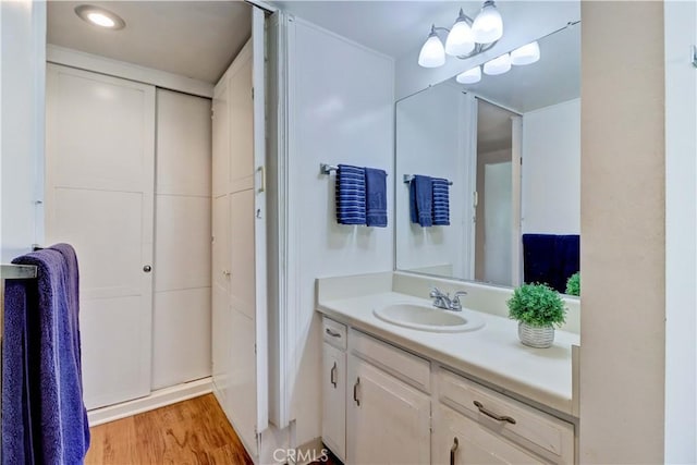 382 Avenida Castilla Unit B, Laguna Woods, CA 92637 - bathroom featuring vanity and wood finished floors