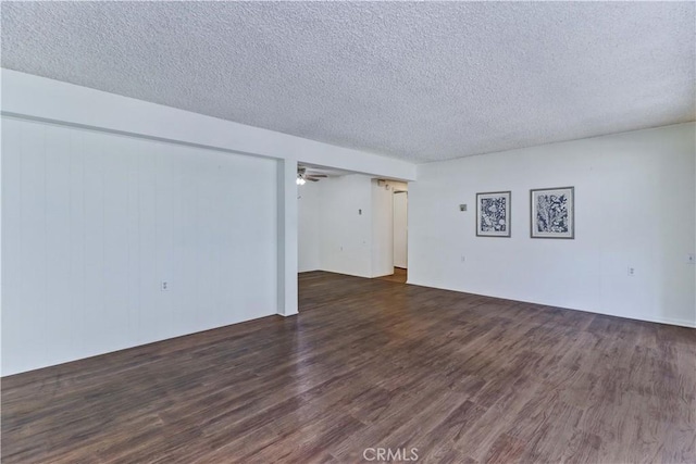 382 Avenida Castilla Unit B, Laguna Woods, CA 92637 - unfurnished living room featuring wood finished floors, a textured ceiling, and ceiling fan