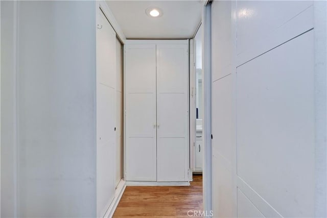 382 Avenida Castilla Unit B, Laguna Woods, CA 92637 - hall featuring light wood finished floors and recessed lighting