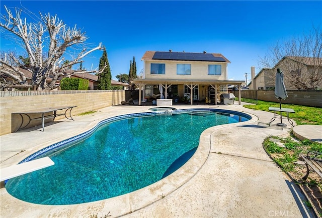 44419 Fenhold, Lancaster, CA 93535 - view of swimming pool featuring a patio area, a fenced backyard, a pool with connected hot tub, and a diving board