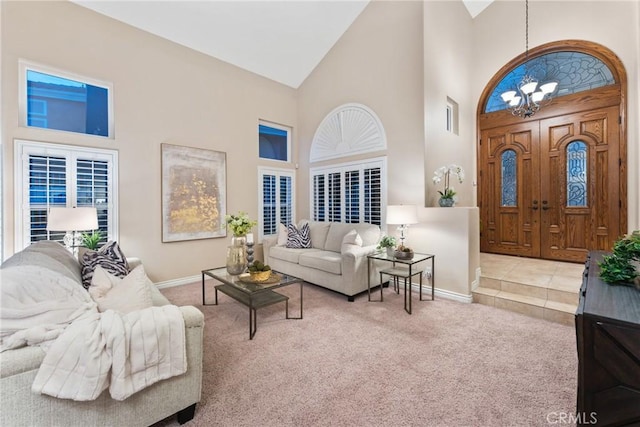530 S Laureltree Dr, Anaheim Hills, CA 92808 - living room featuring high vaulted ceiling, a chandelier, and carpet flooring