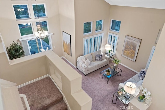 530 S Laureltree Dr, Anaheim Hills, CA 92808 - living room featuring carpet floors, a chandelier, and a high ceiling