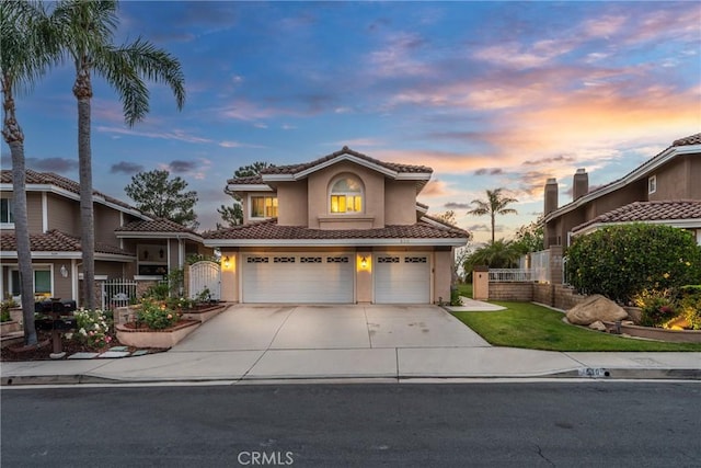 530 S Laureltree Dr, Anaheim Hills, CA 92808 - view of front of property featuring a garage, stucco siding, concrete driveway, and a tile roof