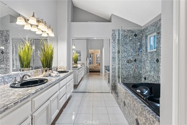 530 S Laureltree Dr, Anaheim Hills, CA 92808 - ensuite bathroom featuring tile patterned flooring, a shower stall, double vanity, lofted ceiling, and a garden tub