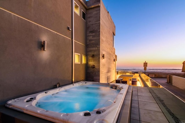 3879 Ocean Front Walk, San Diego, CA 92109 - patio terrace at dusk with a hot tub