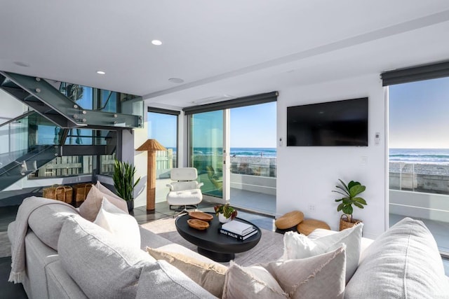 3879 Ocean Front Walk, San Diego, CA 92109 - living area featuring wood finished floors, stairs, and a wall of windows