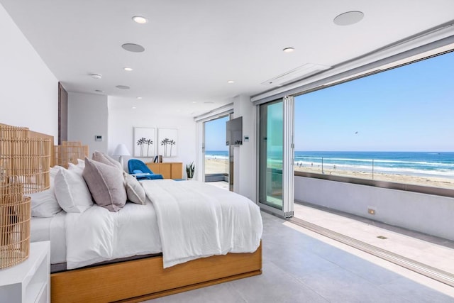 3879 Ocean Front Walk, San Diego, CA 92109 - bedroom with access to outside, multiple windows, view of water and beach, and recessed lighting