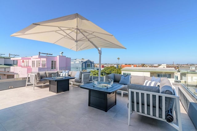 3879 Ocean Front Walk, San Diego, CA 92109 - view of patio with an outdoor living space with a fire pit
