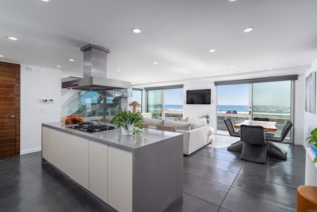 3879 Ocean Front Walk, San Diego, CA 92109 - kitchen featuring island range hood, stainless steel gas cooktop, white cabinetry, modern cabinets, and recessed lighting