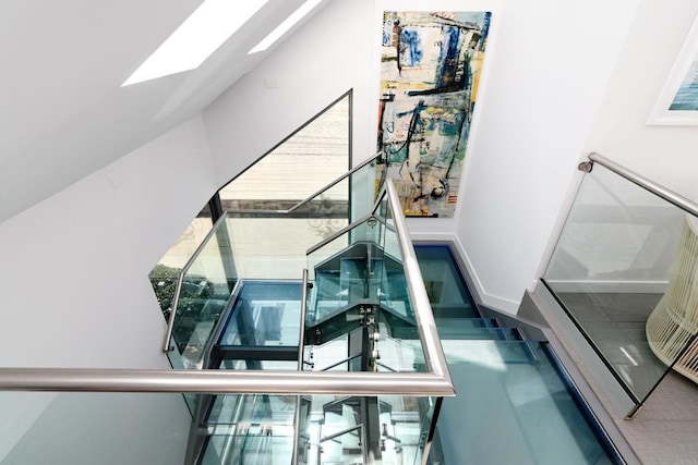 3879 Ocean Front Walk, San Diego, CA 92109 - stairs featuring a skylight and baseboards